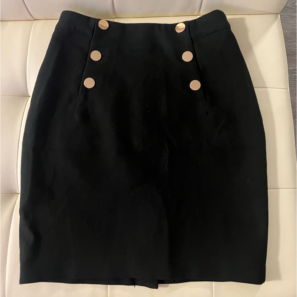 Black skirt with gold buttons